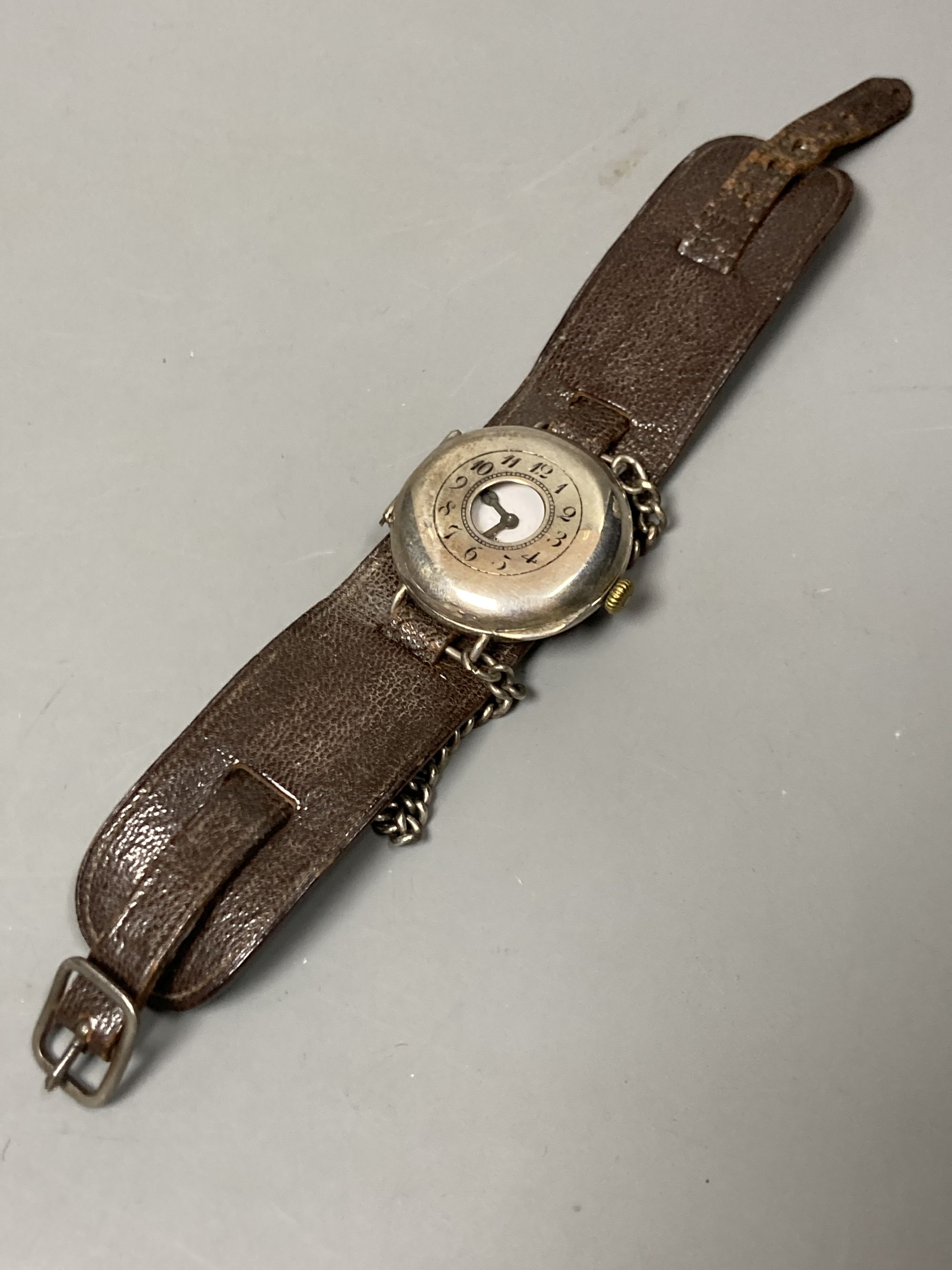 Two gentleman's early 20th century silver cased manual wind wrist watches, including half hunter.